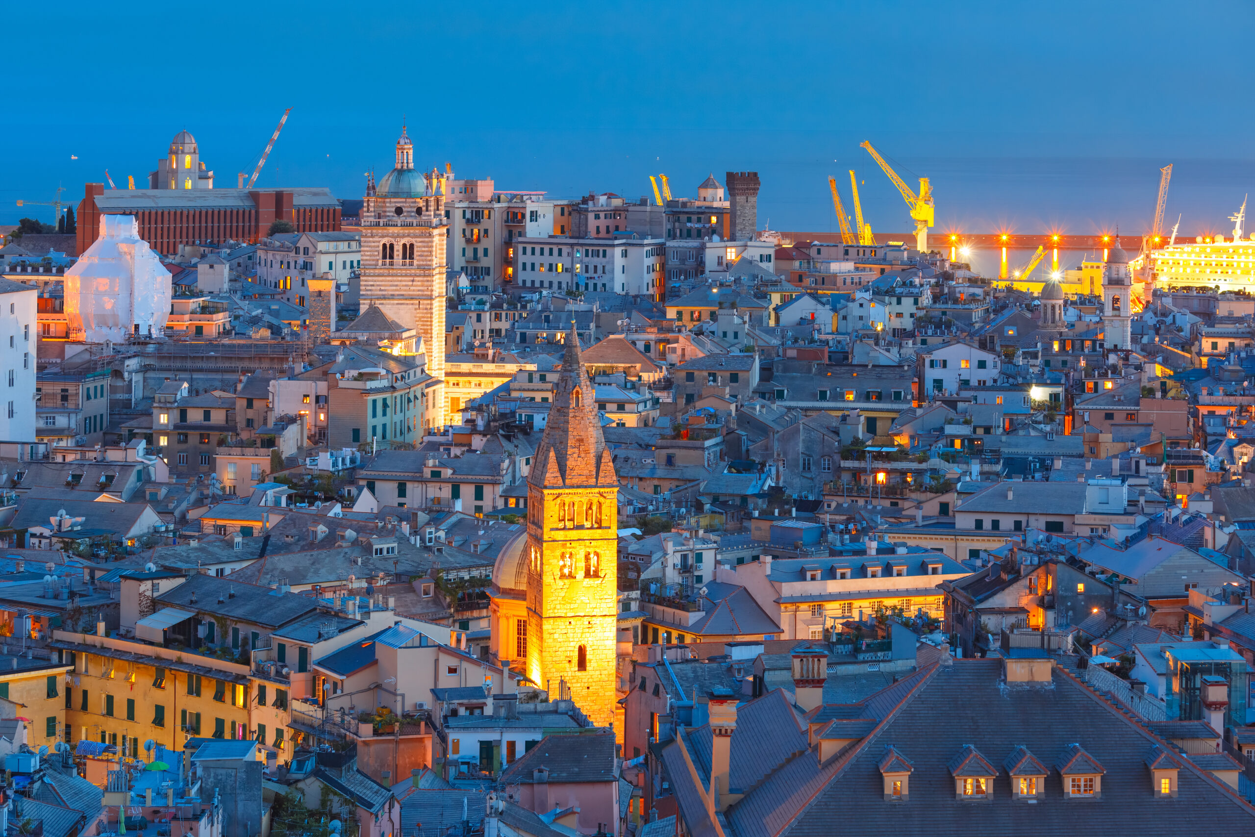 Old town and port of Genoa at night, Italy.